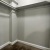 carpeted walk-in closet